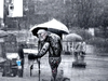 Old tattooed man in the rain.png